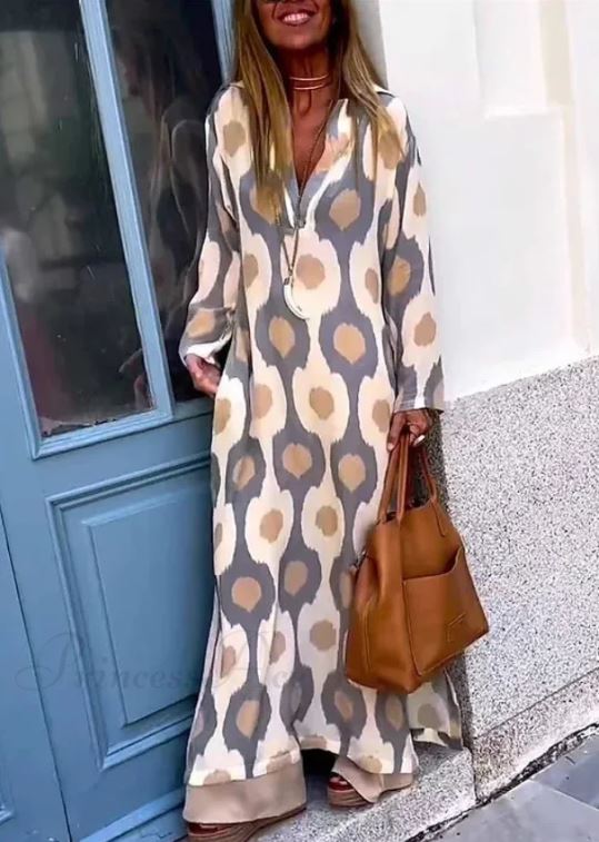 Vestido boho de decote em V com estampado geométrico e abertura