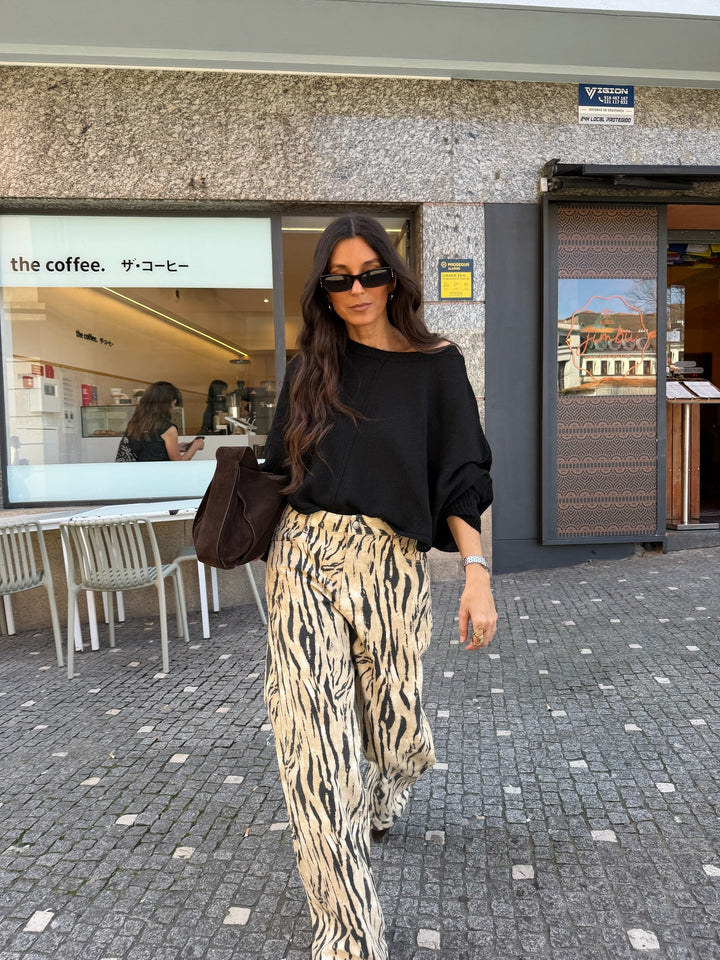 Calças de perna larga com estampa de zebra