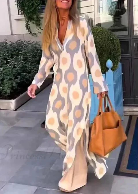Vestido boho de decote em V com estampado geométrico e abertura