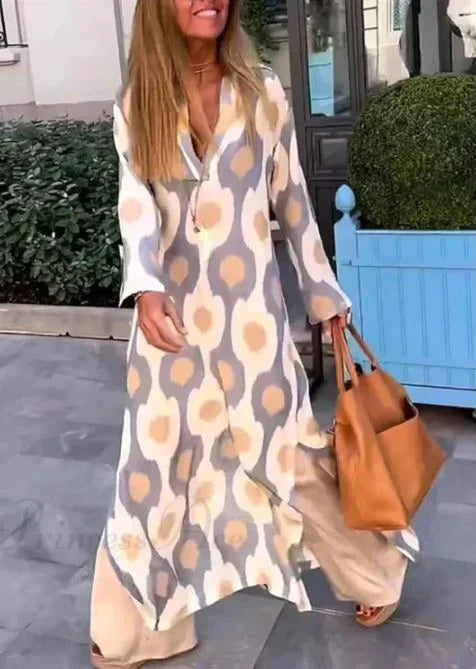 Vestido boho de decote em V com estampado geométrico e abertura