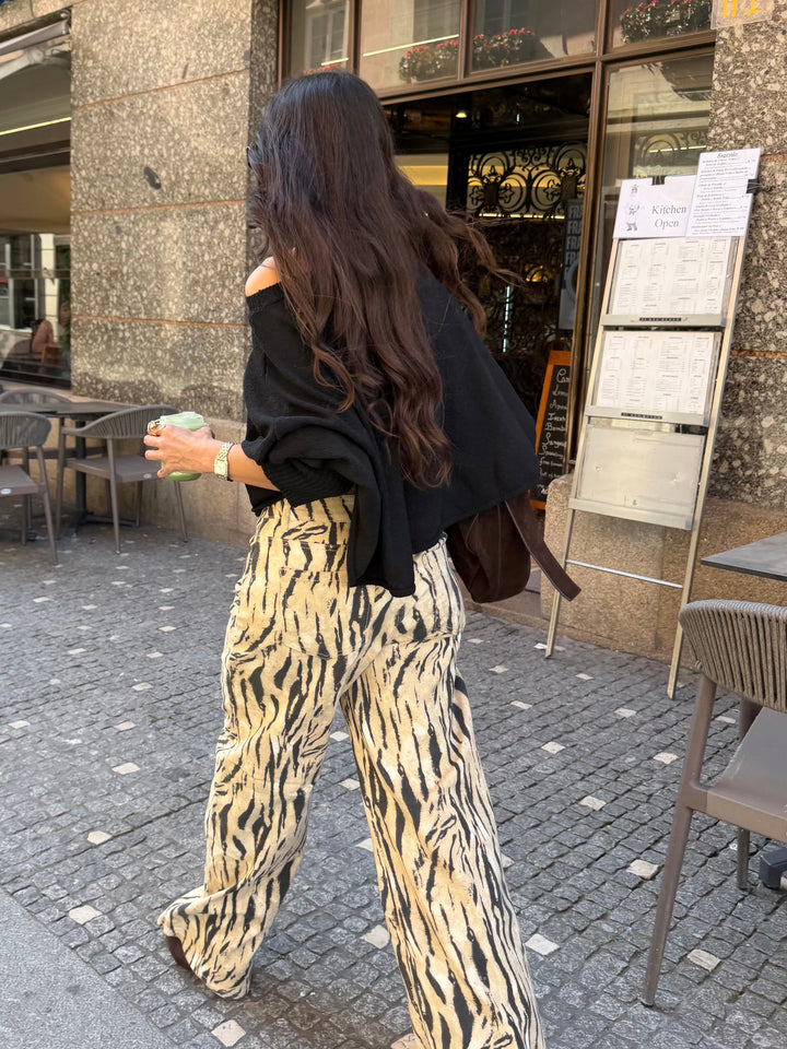 Calças de perna larga com estampa de zebra