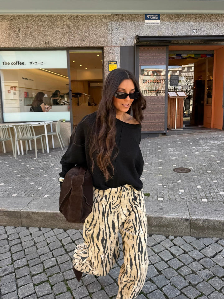 Calças de perna larga com estampa de zebra